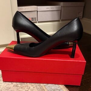 Elegant Black Leather Heels with Gold Accents